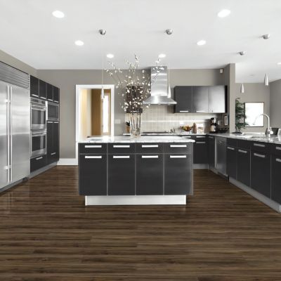 kitchen with dark LVP wood look waterproof floors in a Abbotsford kitchen